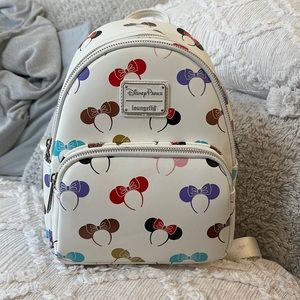 Disney Parks Loungefly. Minnie Ears. With Minnie Ear holder. Only used once.